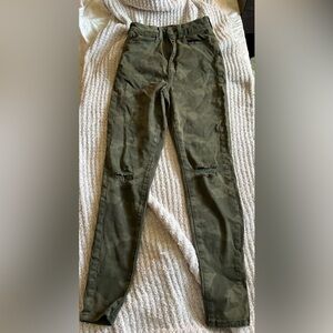 American eagle next level stretch . Ripped on knees . Worn once size 6